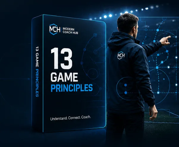 The course box beside a coach pointing at a tactical
field diagram lit up over a stadium pitch.